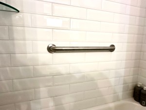 Straight shower grab bar installation on tile wall in Mansfield TX